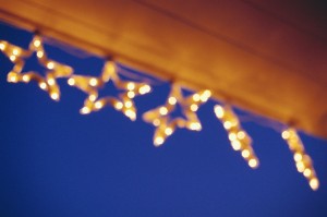 Star Christmas Lights Hanging from an Eave